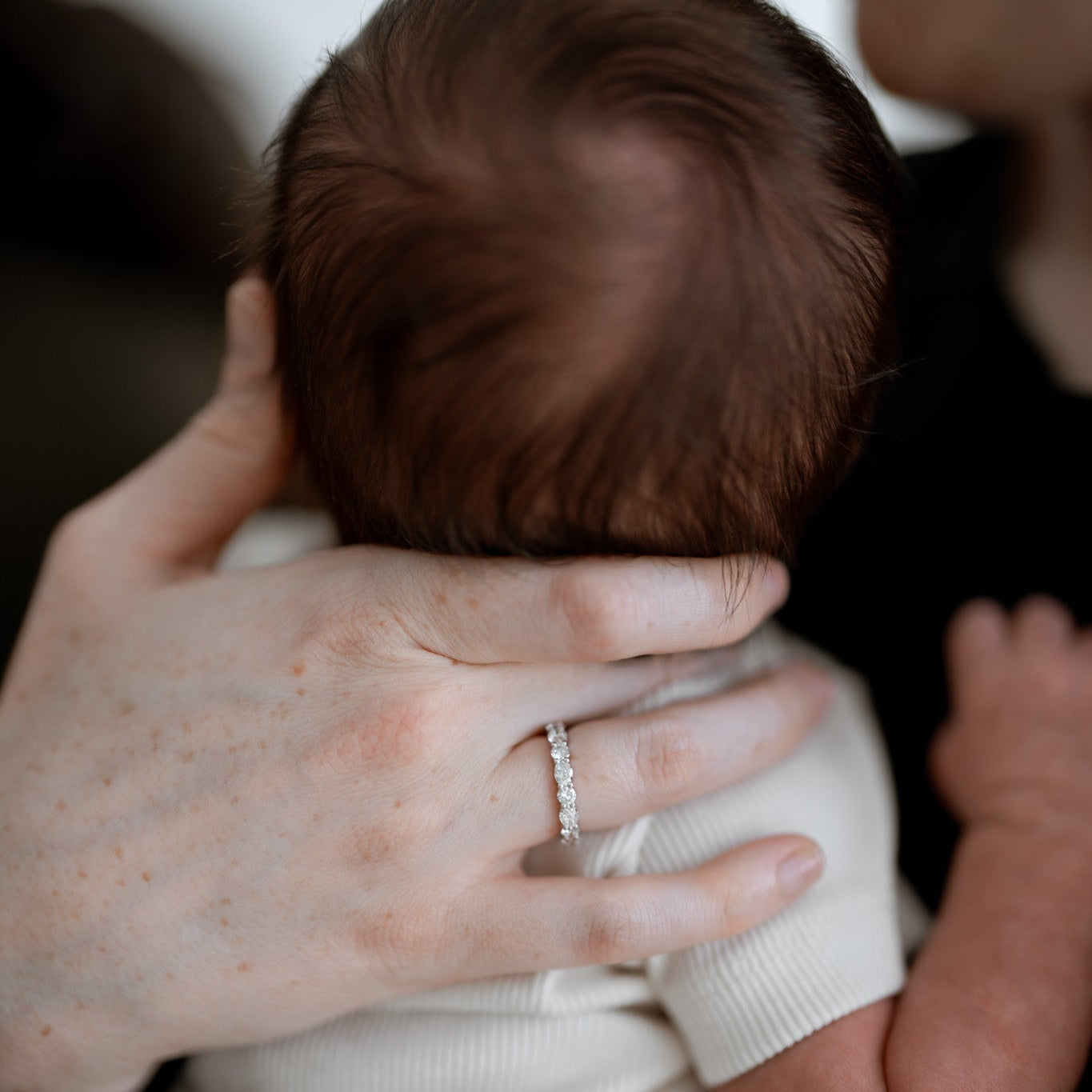 alternating round and oval diamond eternity band