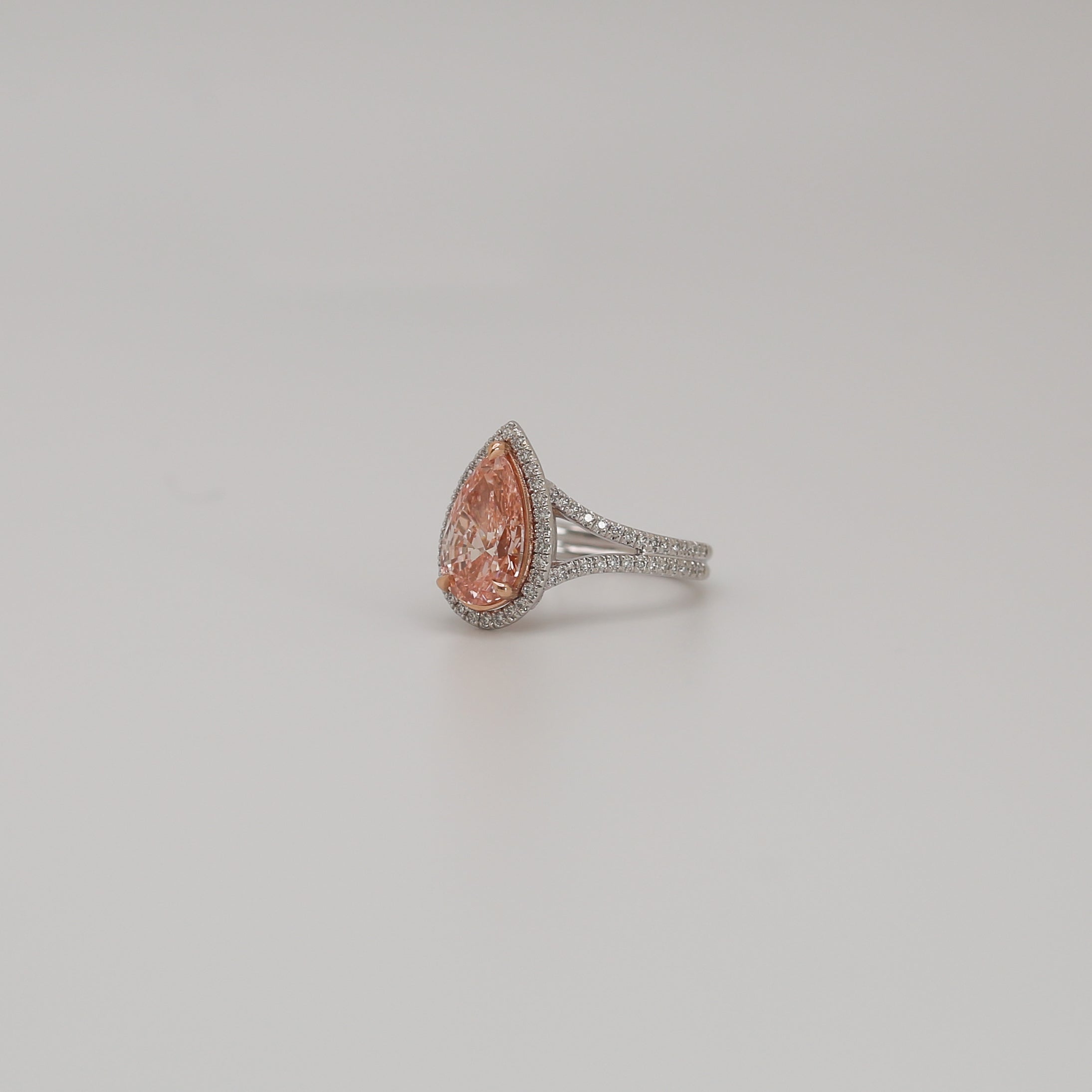 Vivid Pink Pear Halo Engagement Ring