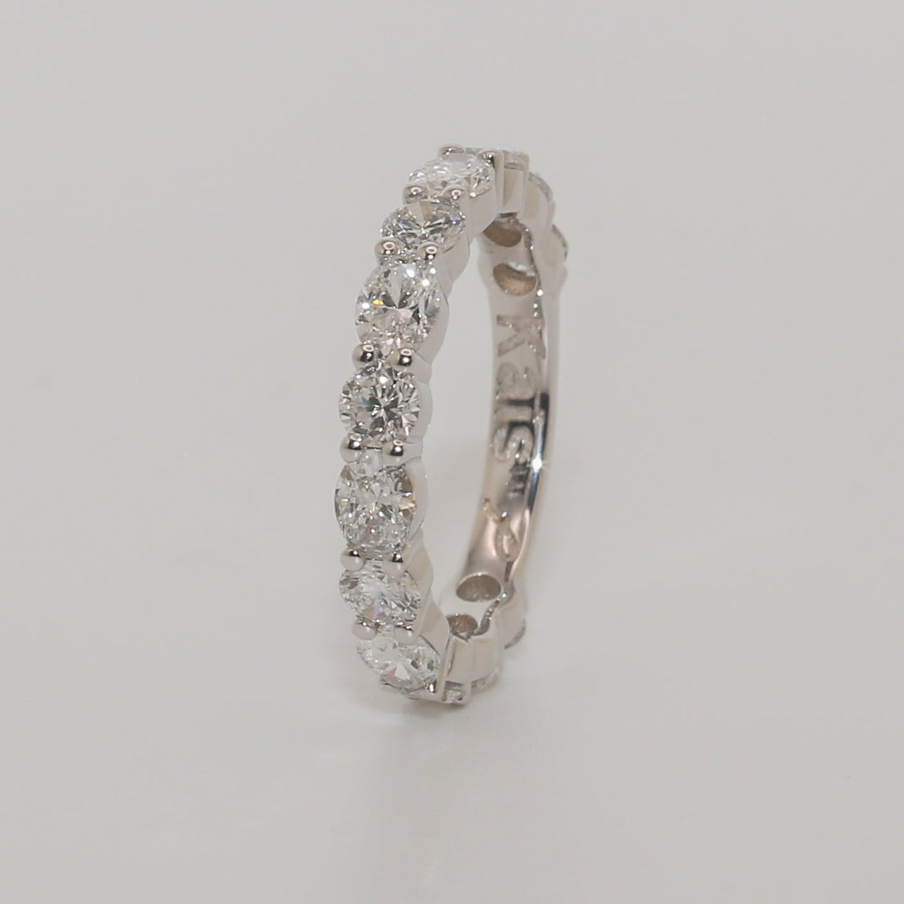alternating round and oval diamond eternity band