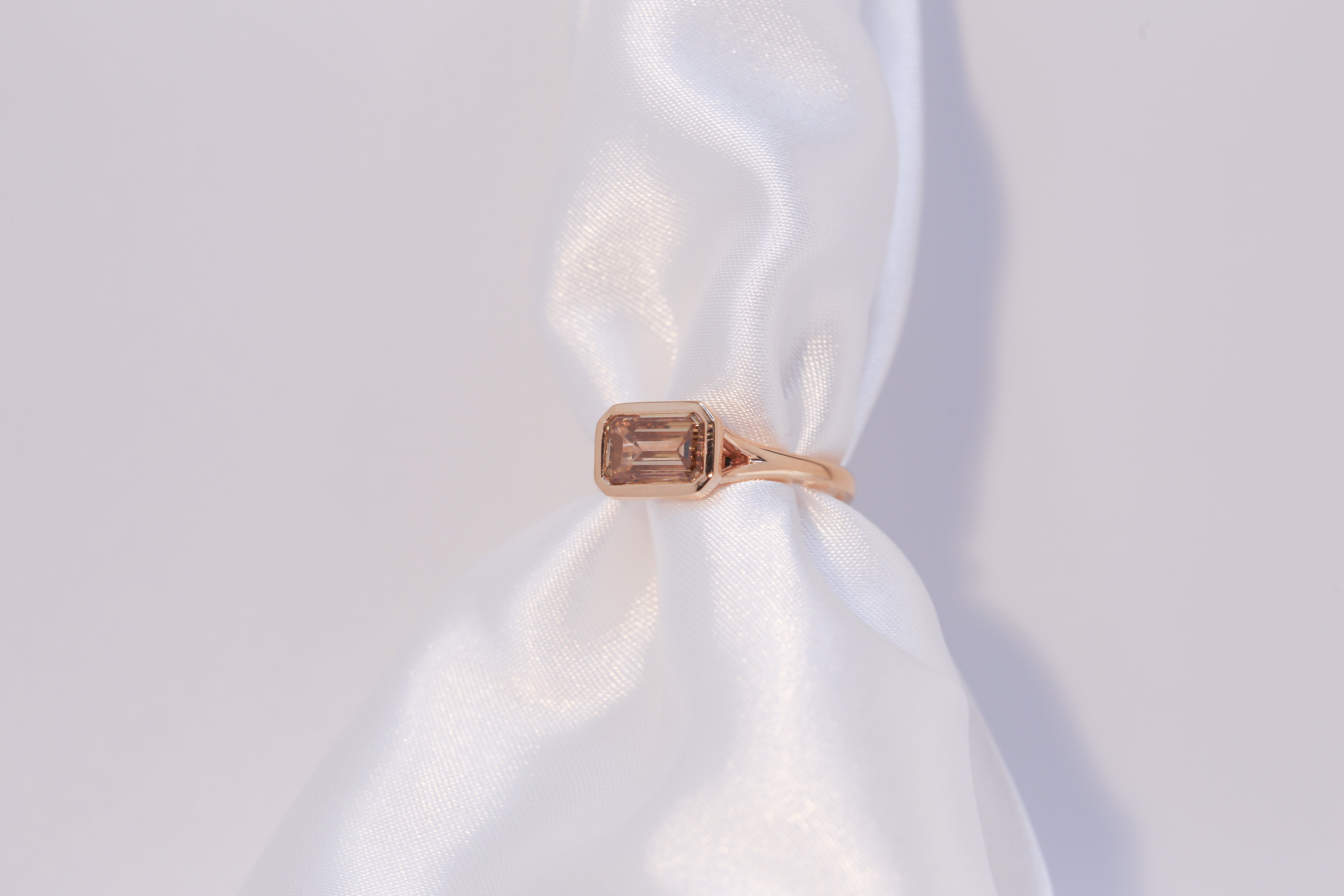 East-West Bezel Diamond Ring