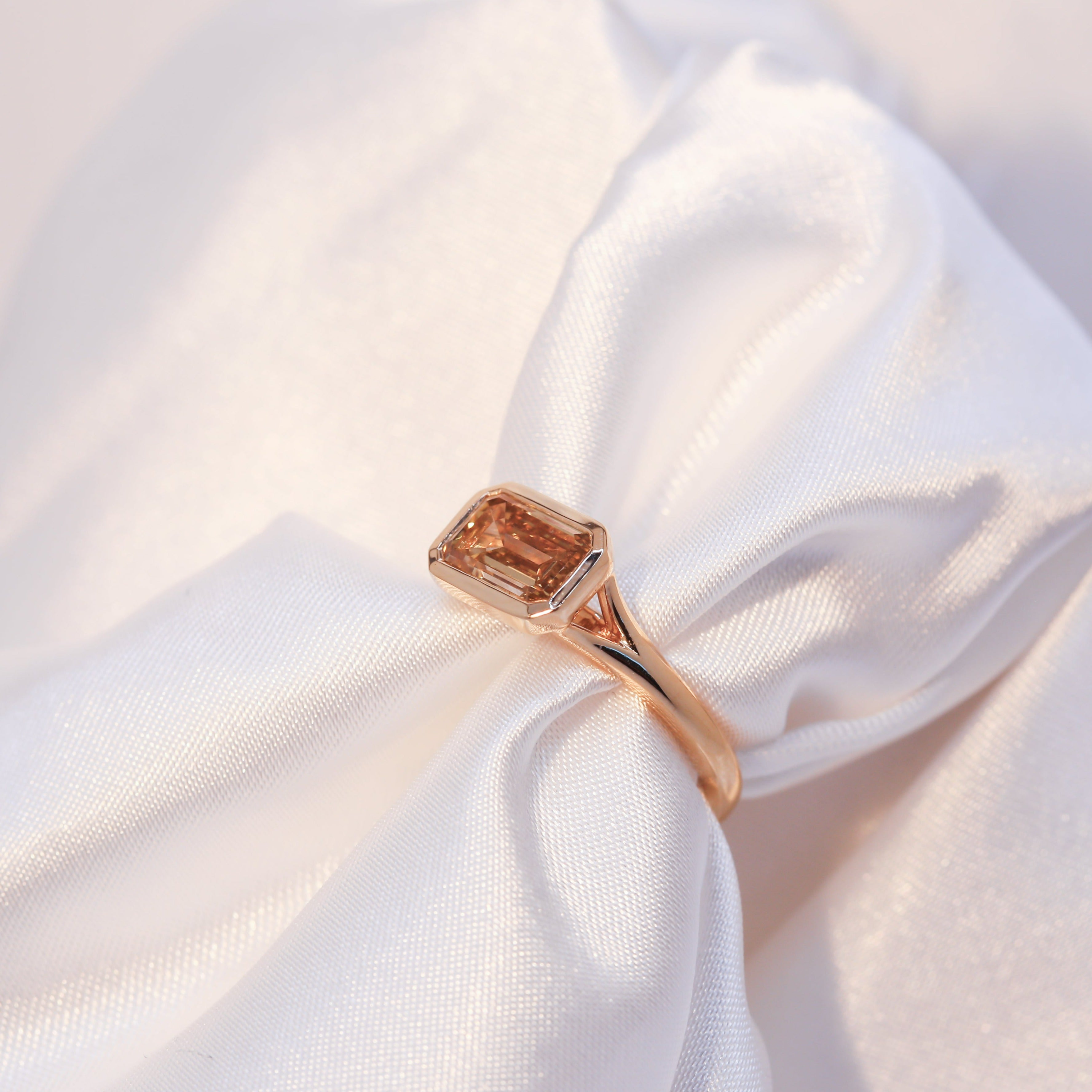 East-West Bezel Diamond Ring