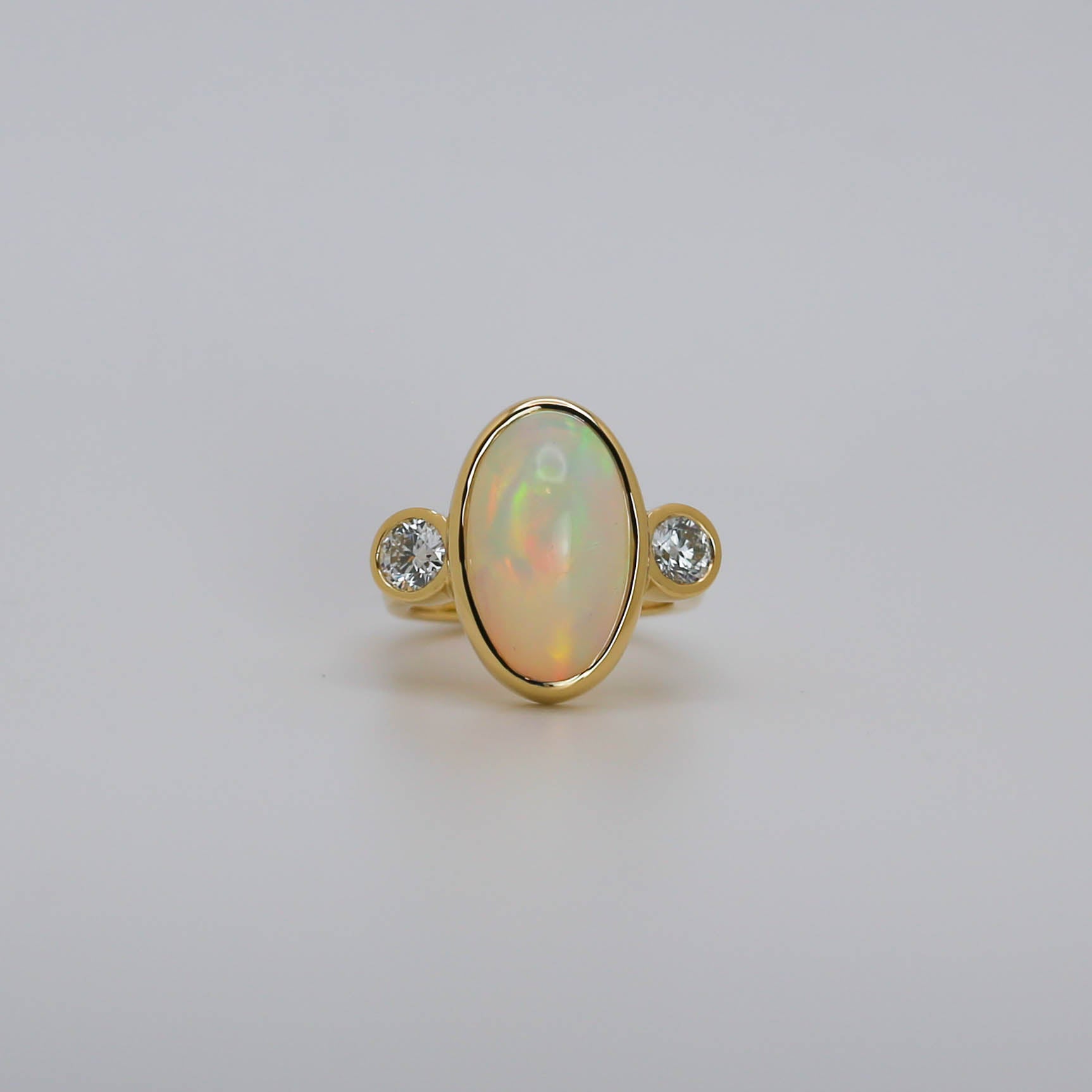 3 Stone Opal and diamonds ring