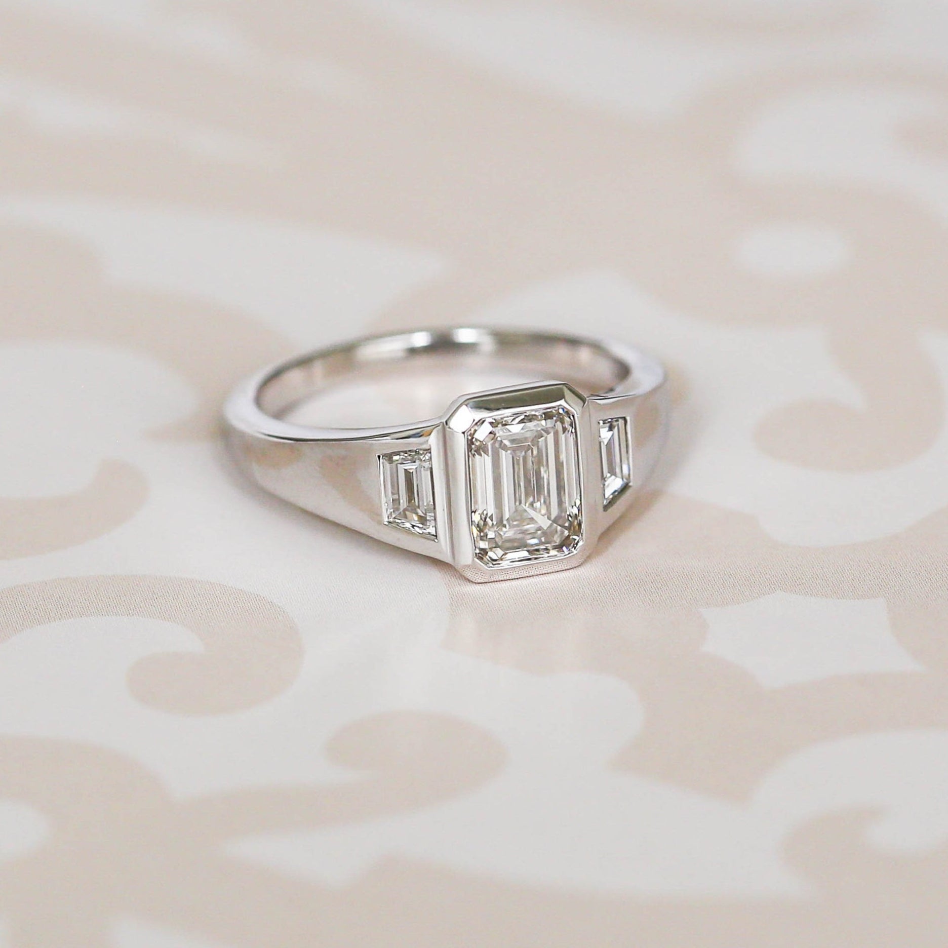 Emerald Three Stone Engagement Ring
