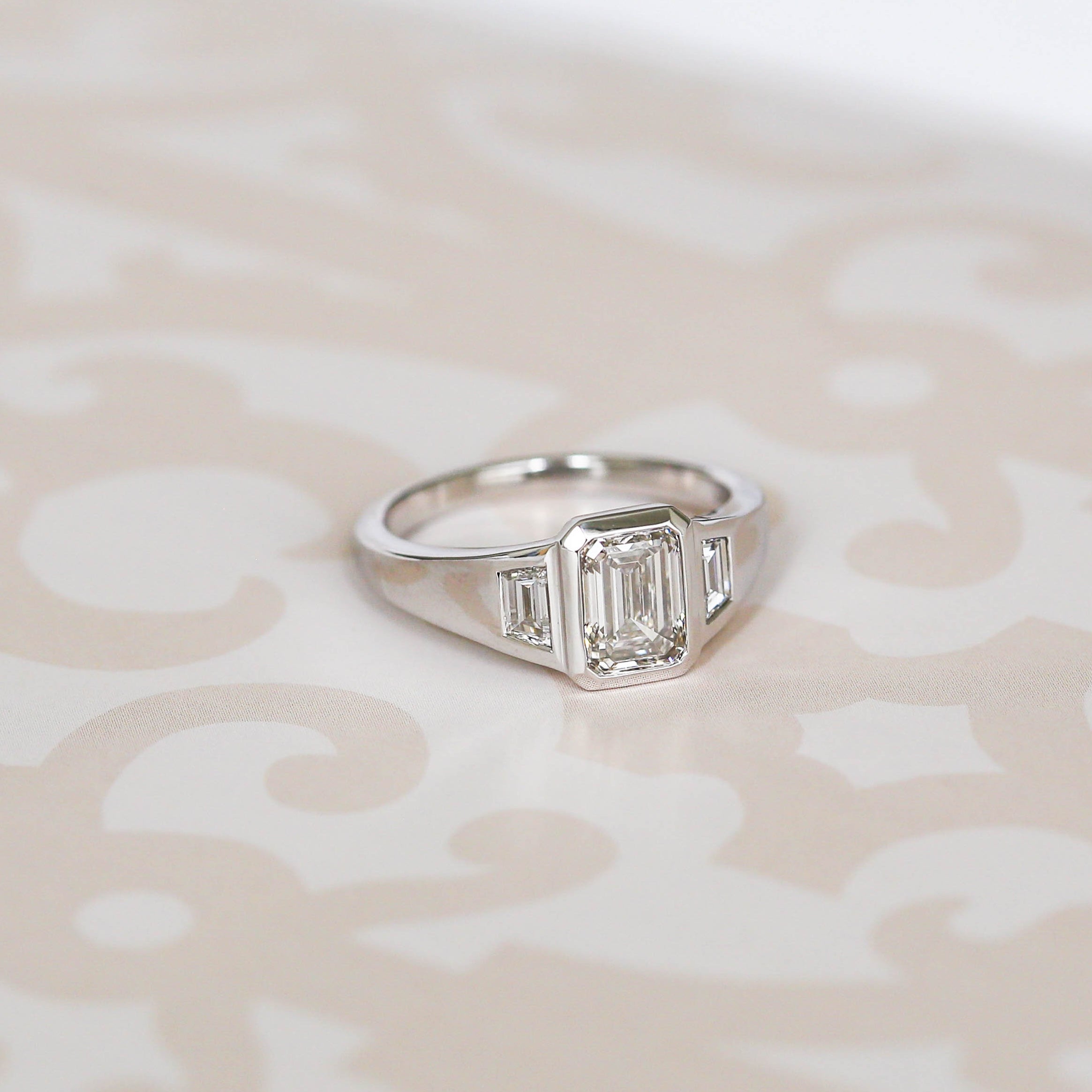 Emerald Three Stone Engagement Ring