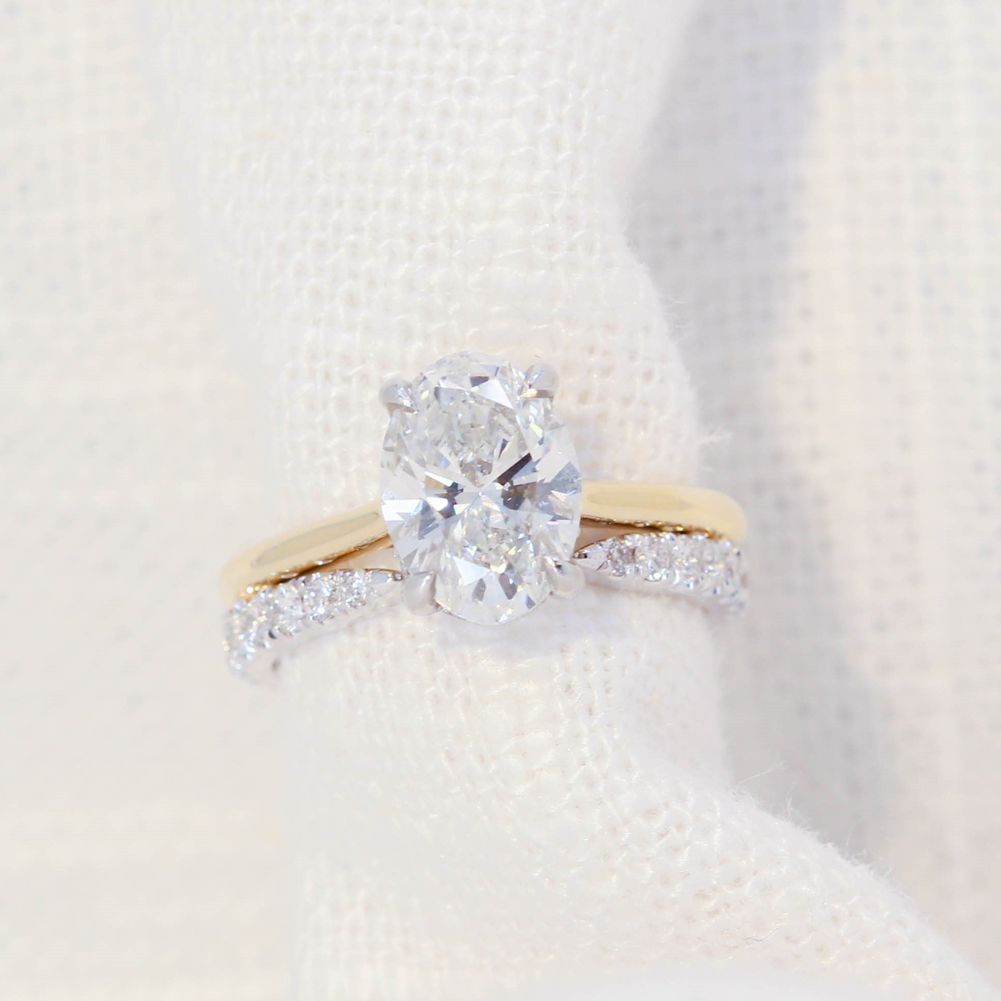 Cathedral Solitaire Oval Diamond Engagement Ring