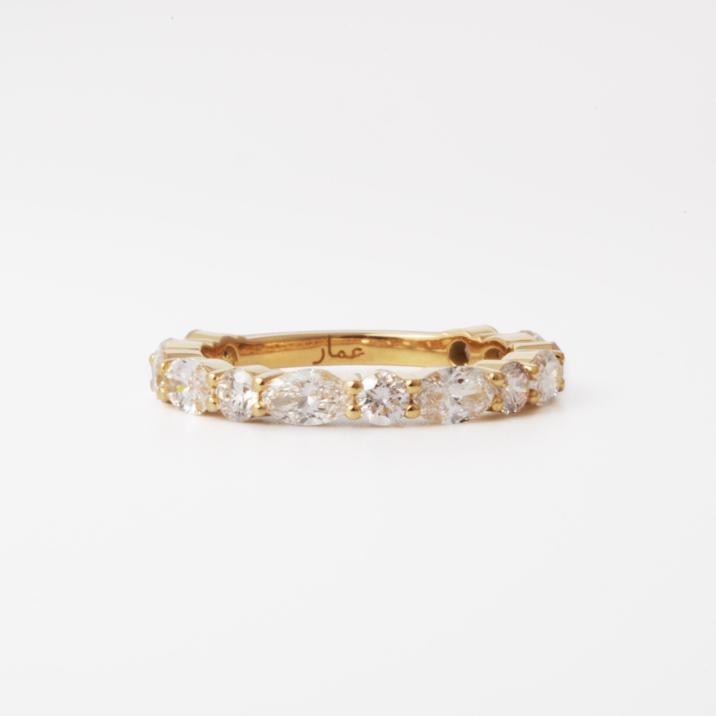 alternating round and oval diamond eternity band